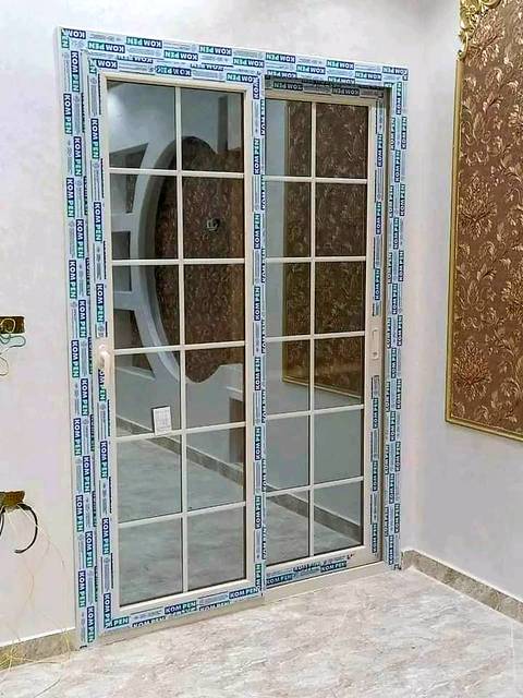 White uPVC sliding door with glazing bars