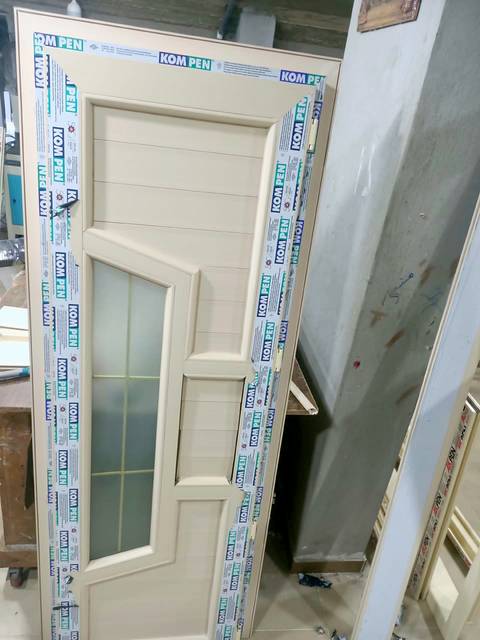 Cream uPVC door with a frosted glass panel