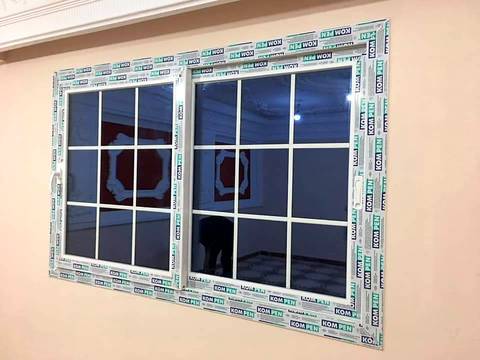 White Kompen uPVC window with glazing bars